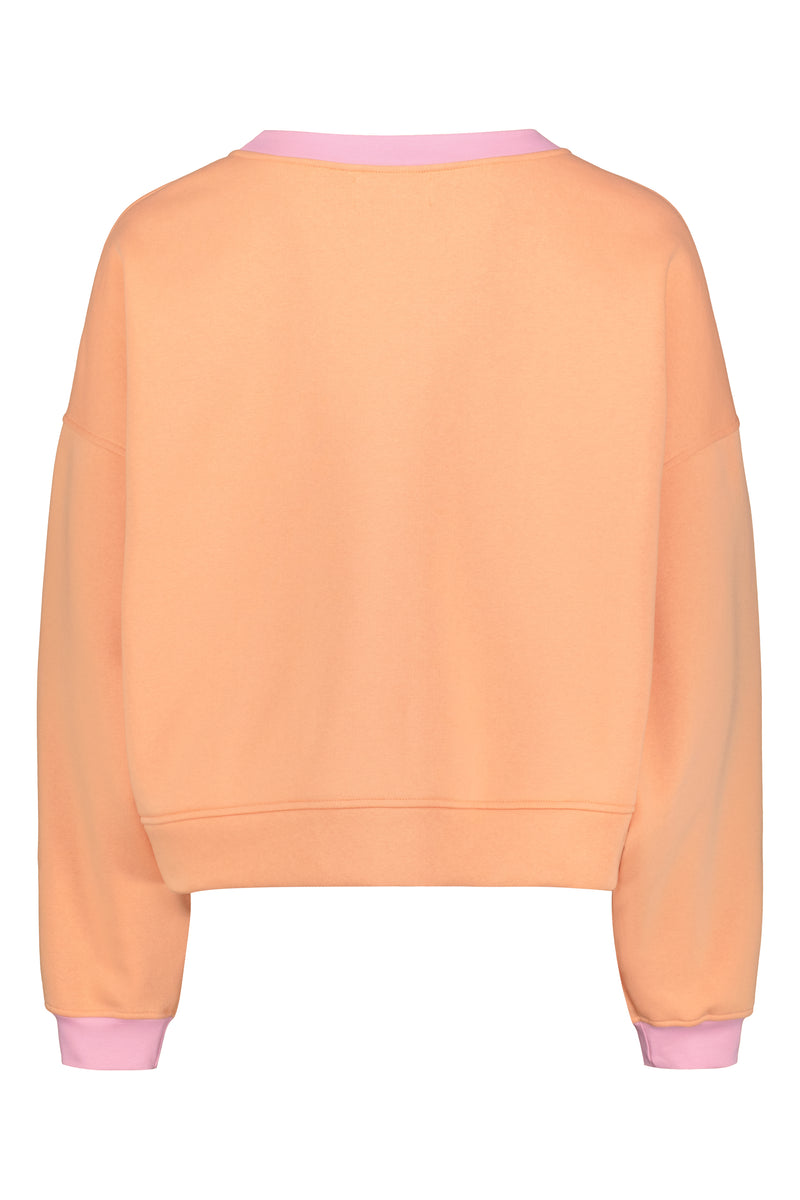 R/H Studio Mickey Loose Sweater värissä Sunset Peach.