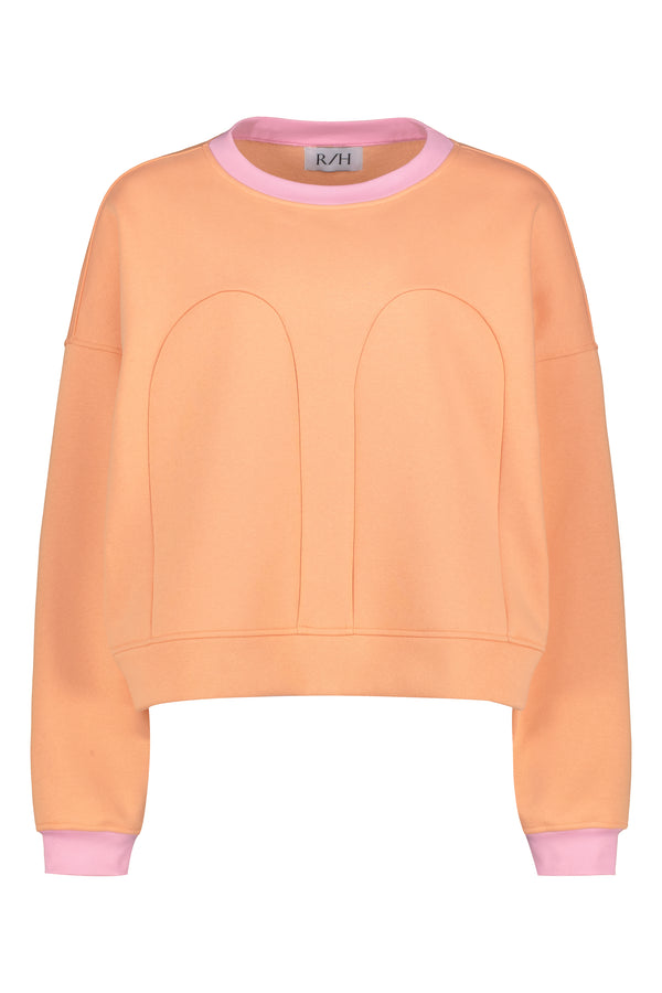R/H Studio Mickey Loose Sweater värissä Sunset Peach.